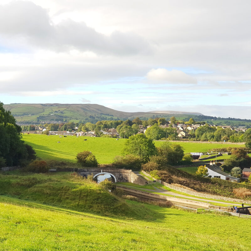 view across greenberfield locks towards barnoldswick square